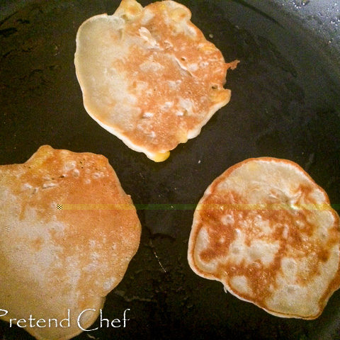 Sweetcorn fritters in frying pan