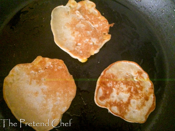 Sweetcorn fritters in frying pan