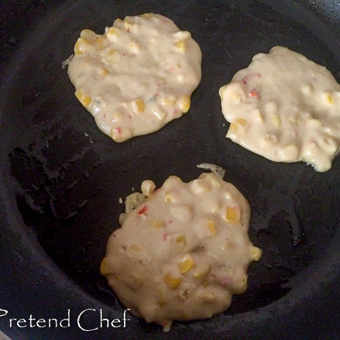 Sweetcorn fritters in frying pan