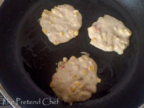 Sweetcorn fritters in frying pan