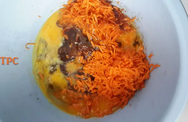 mix of wet ingredients for moist carrot cake