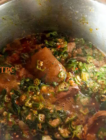 okro soup, okra soup cooking in a pot