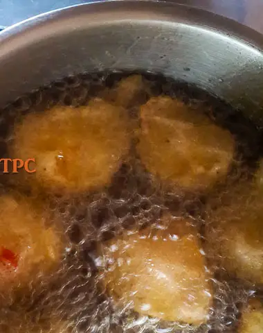 plantain mosa frying in hot oil