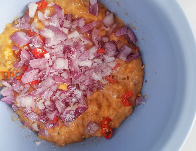 onions and pepper in mashed plantain for plantain mosa