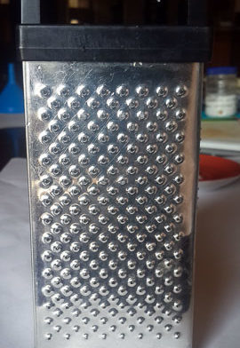 box grater used for ojojo water yam fritters