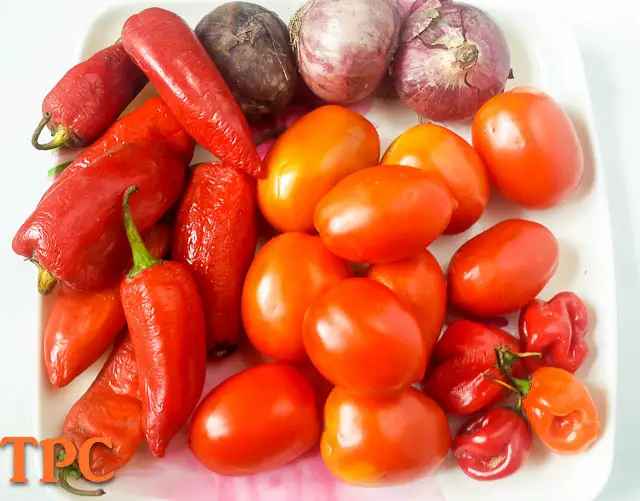 tomato, tatashe pepper, scotch bonnet, onions for nigerian tomato stew base