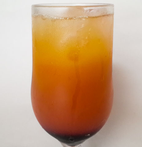 sweet and zesty tropical sunset afterglow mocktail