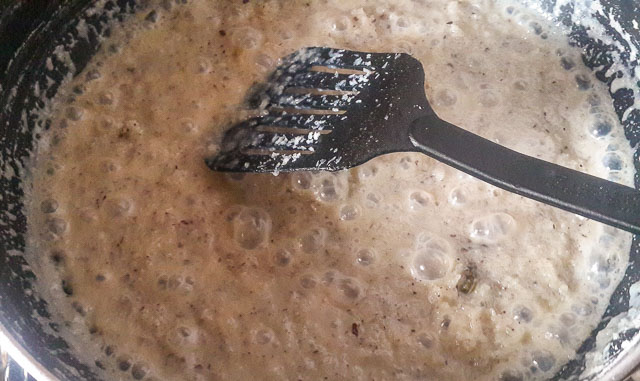 Indian coconut ladoo bubbling in sauce pan