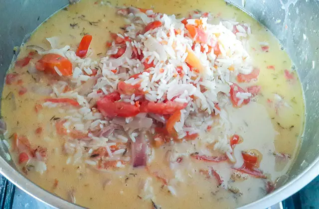rice cooking in coconut milk for Nigerian Coconut Rice