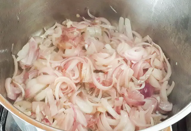 onions sauteed for Nigerian Coconut Rice