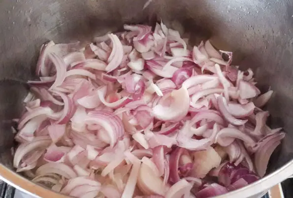 sliced onions for Nigerian Coconut Rice