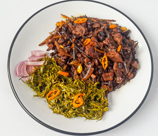 Healthy, vegetarian achicha, dry cocoyam with black beans