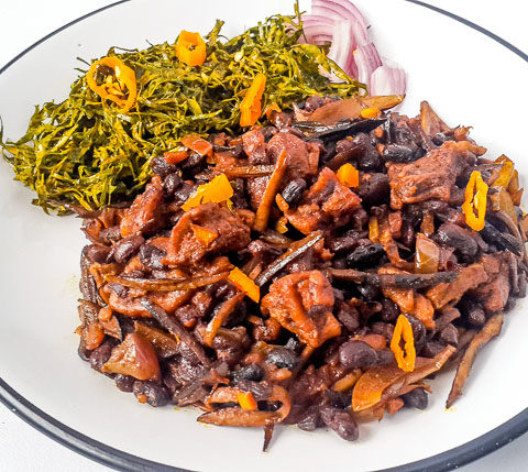 Healthy, vegetarian achicha, dry cocoyam with black beans