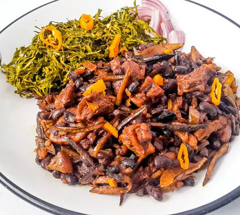 Healthy, vegetarian achicha, dry cocoyam with black beans