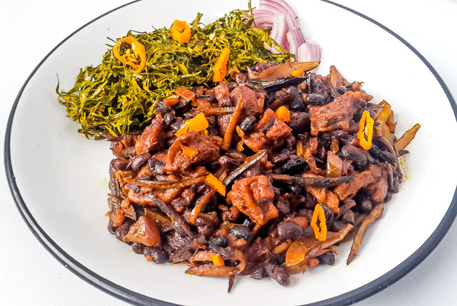 Healthy, vegetarian achicha, dry cocoyam with black beans