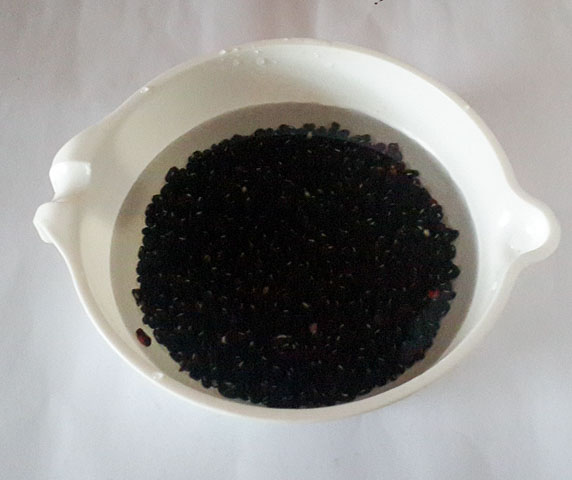 black beans soaked for cooking achicha, dry cocoyam