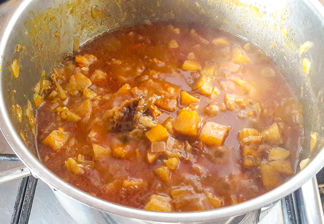 plantains porridge boiling in a pot