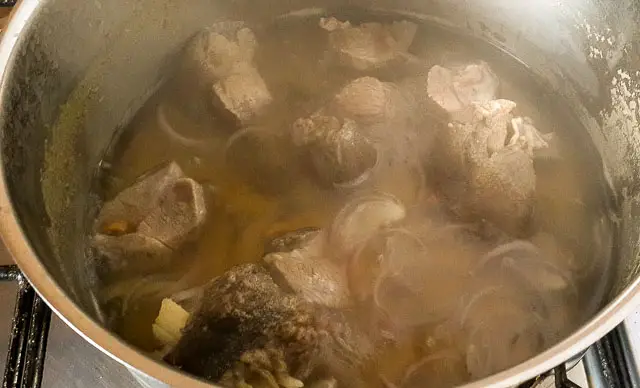 boiled goat meat in its stock for yam pepper soup