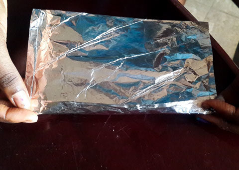 foil pocket ready to be filled with okpa mix