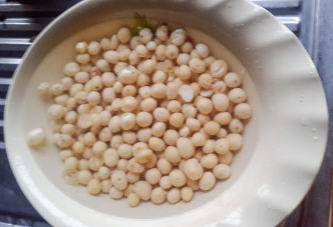 shelled okpa seeds soaked in water