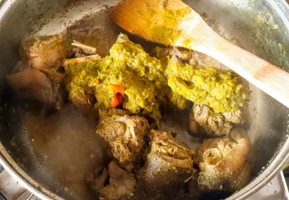Jamaican goat curry getting ready in a pot