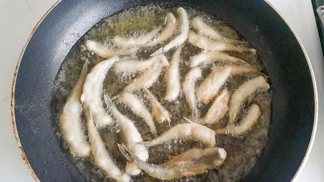 white bait frying for Nigerian crispy fried whitebait fish