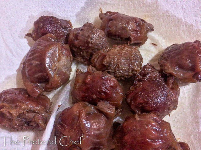 gizzard fried and drained on kitchen napkins for Nigerian peppered gizzard-1-16