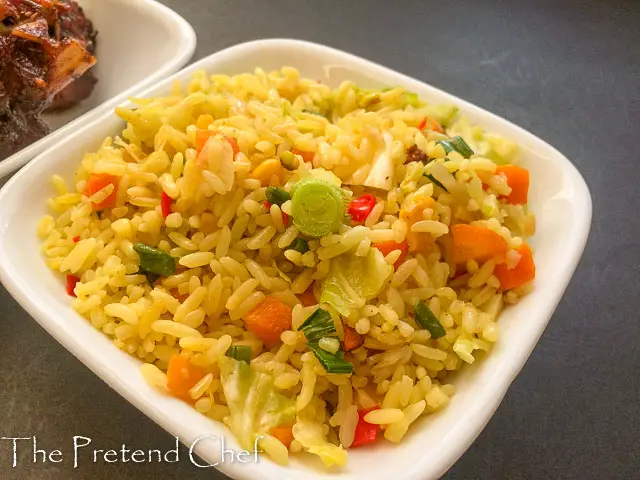 golden delicious Nigerian stir fried rice with vegetables