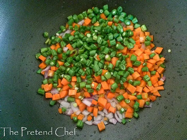 vegetables being sauteed for Nigerian stir fried rice-1