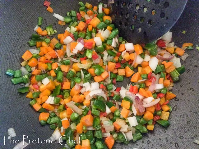 frying vegetables for Nigerian stir fried rice-1