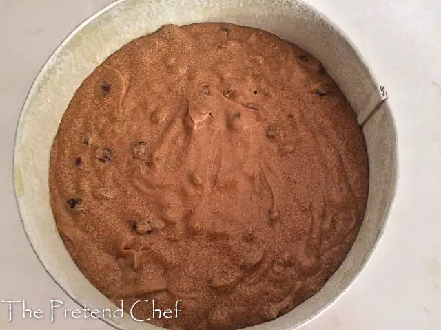 moist fruit cake in a round cake tin