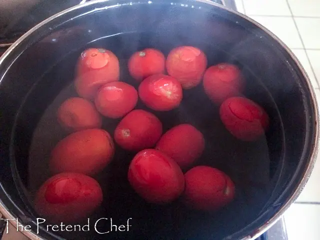 whole tomatoes in boiling hot water for how to blanch vegetables