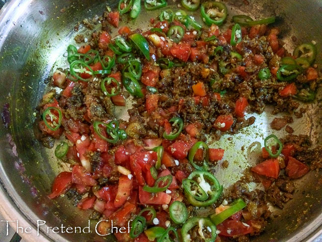 curry and tomatoes frying for simple coconut curry sauce