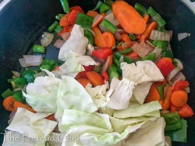 vegetables being sauteed for Easy Nigerian vegetable sauce