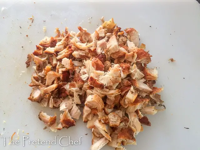 shredded fried chicken for chicken salad with candied carrot coins