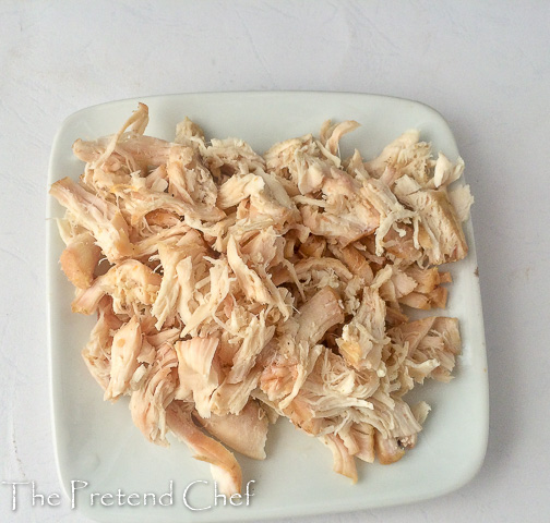 shredded boiled chicken for chicken salad with candied carrot coins
