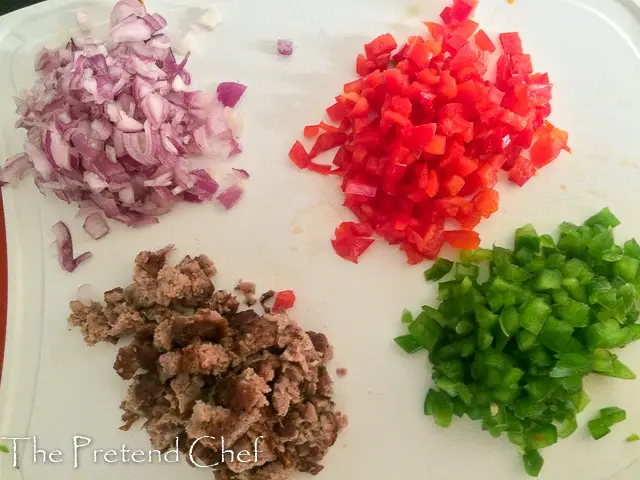 chopped vegetables on a chopping board for egg muffin