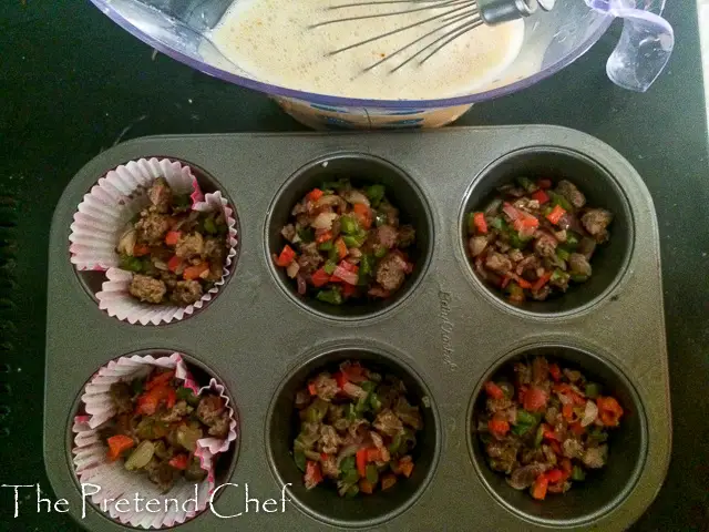 vegetables and meat in muffin pan