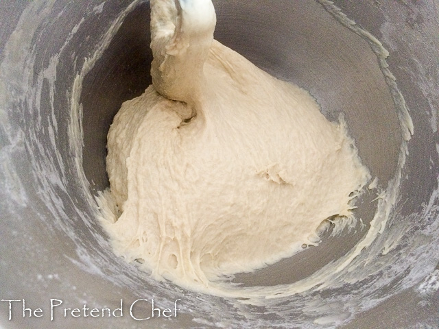 homemade pizza dough in mixer bowl