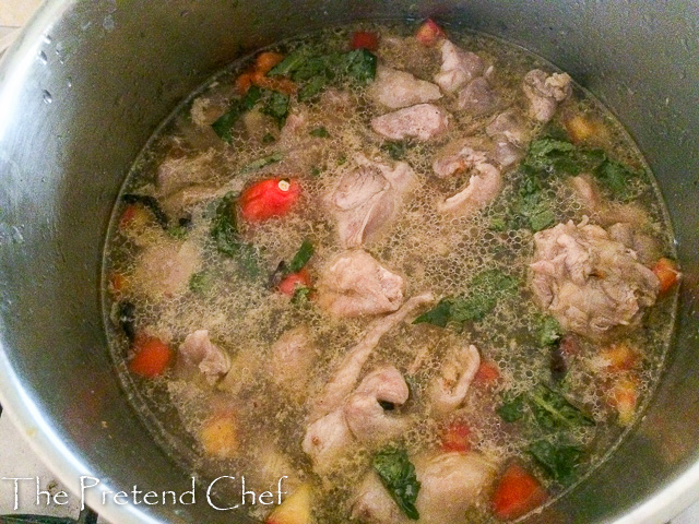 chicken pepper soup boiling in a pot