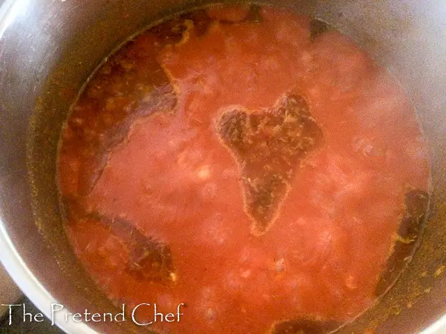 Fresh, light and healthy Nigerian boiled tomato stew boiling