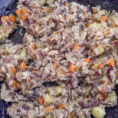 mashed fish and vegetables frying for Nigerian fish pie