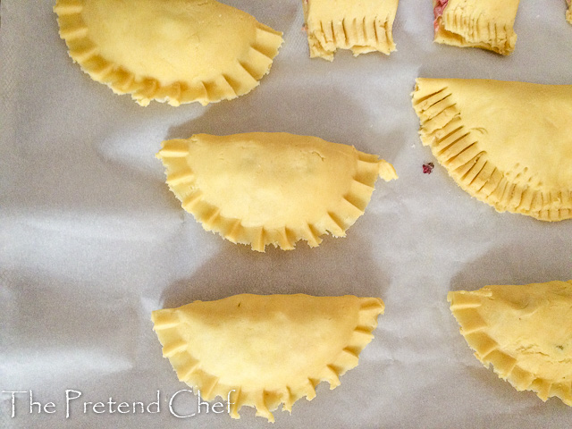 raw Nigerian meat pie on baking tray