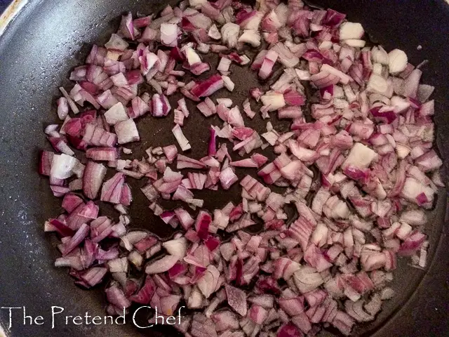 frying onions for Nigerian meat pie