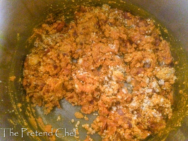 onions and egusi in palm oil for fried egusi soup