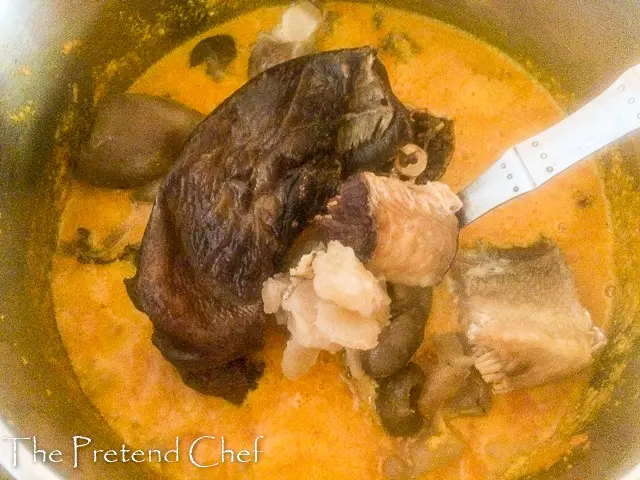 meat and fish added to fried egusi soup