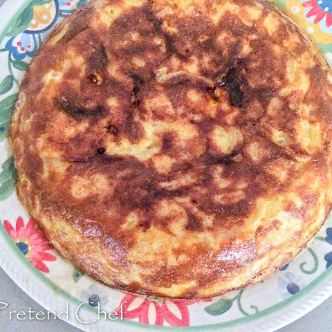 easy spanish omelette flipped into a plate