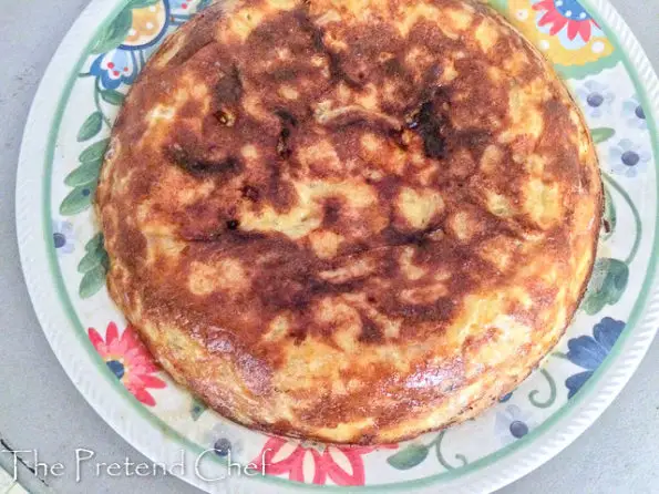 easy spanish omelette flipped into a plate