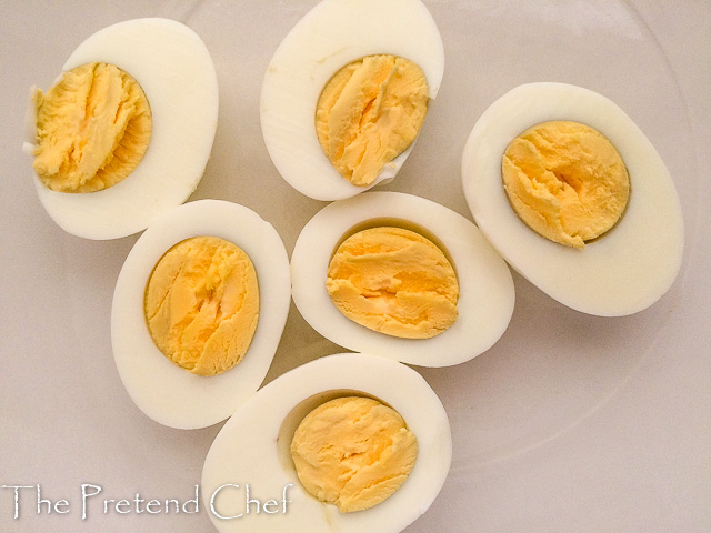 sliced boiled egg for stuffed eggs, devilled eggs