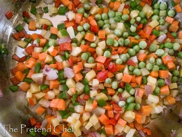 vegetables frying for Nigerian vegetable pie